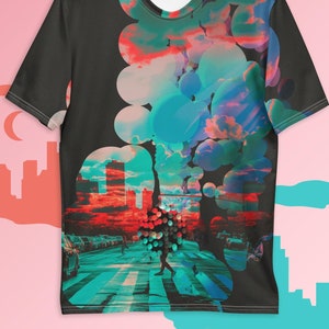 May include: A black t-shirt with a colorful abstract design featuring a cityscape, clouds, and circles. The design is a blend of blue, green, red, and pink.
