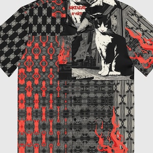 May include: Short-sleeved shirt with a patchwork design. The shirt features a black and white cat graphic, geometric patterns, and red flame-like accents. The text "RAKENERD BY KICK" is visible on the collar.