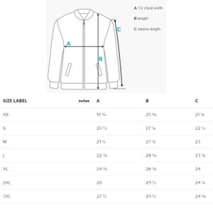 Puede incluir: Tabla de tallas para una chaqueta con medidas en pulgadas para la mitad del ancho del pecho, la longitud y la longitud de la manga. Las tallas incluyen XS, S, M, L, XL, 2XL y 3XL.