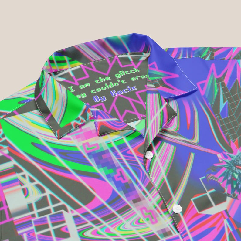 May include: A colorful button-up shirt with a psychedelic pattern. The collar has a black and white label with the text "I am the glitch they couldn't erase By Kocix".
