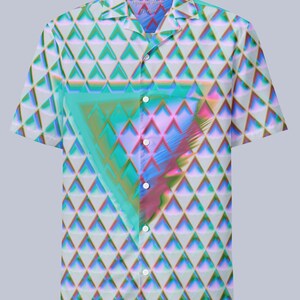 May include: A short-sleeved button-up shirt with a geometric pattern of overlapping triangles in shades of blue, green, pink, and white. The shirt has a collar and a button-up front.