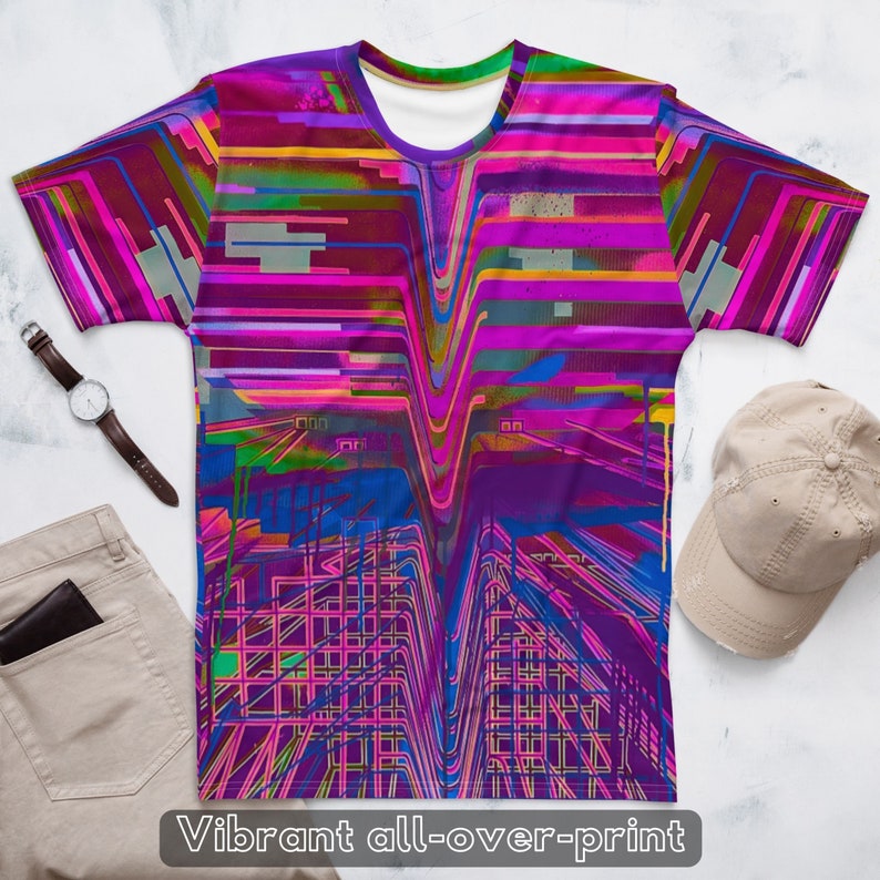 May include: A short-sleeved t-shirt with a vibrant all-over print featuring a geometric pattern in shades of pink, blue, green, and yellow.