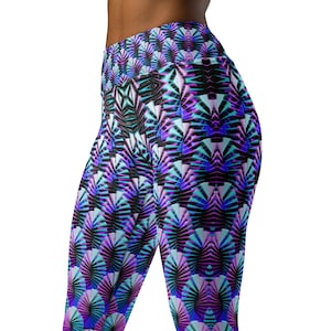 May include: High-waisted leggings with a geometric pattern in shades of purple, teal, and black. The design features repeating fan-like shapes, creating a textured, three-dimensional effect. The leggings are form-fitting and made of a stretchy material.