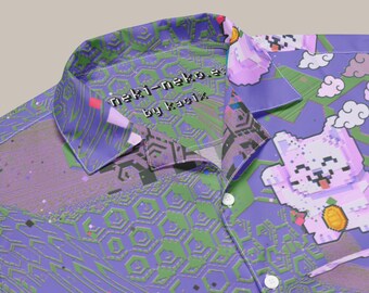 May include: A button-down shirt with a vibrant, pixelated design. The shirt features a purple and green geometric pattern, with a pixelated cat graphic and the text "neki-neko.es by kapix" on the collar. White buttons complete the look.