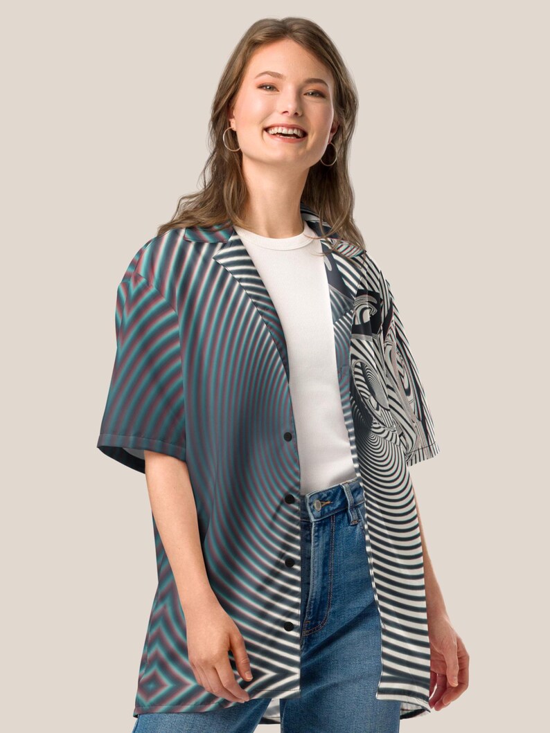 May include: A short-sleeved button-down shirt with a black, white, and red abstract pattern. The shirt has a relaxed fit and a collar.