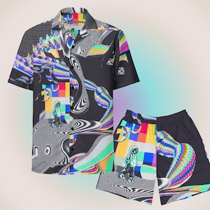 May include: A black and white short-sleeved button-up shirt and matching shorts with a colorful, abstract, pixelated design. The design features a person in a blue hoodie standing on a gray and white surface.