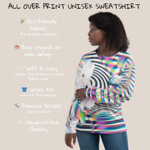 May include: A unisex sweatshirt with a colorful, abstract all-over print. The sweatshirt is made from eco-friendly fabric with 95% recycled materials. It features a soft cotton-feel exterior and brushed fleece inside. The sweatshirt has overlock seams and is handcrafted.