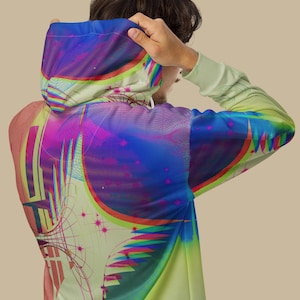 May include: A hooded sweatshirt with a vibrant, abstract design. The artwork features a blend of blue, purple, pink, and green hues, with geometric shapes and lines. The sleeves are a light green color, and the background is a neutral beige.