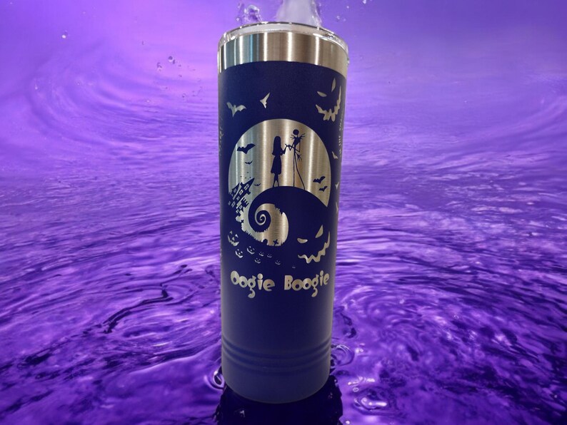 May include: A blue stainless steel tumbler with a laser-etched design of Jack Skellington and Sally from The Nightmare Before Christmas. The design includes the words "Oogie Boogie".