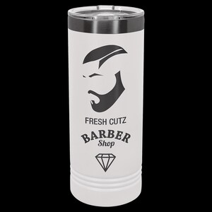May include: White stainless steel tumbler with a black and white graphic of a man's face with a beard and the text "FRESH CUTZ BARBER Shop" and a diamond.