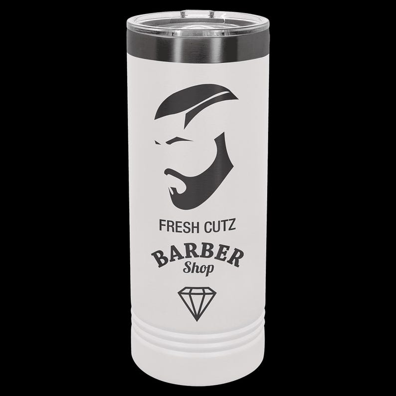 May include: White stainless steel tumbler with a black and white graphic of a man's face with a beard and the text "FRESH CUTZ BARBER Shop" and a diamond.