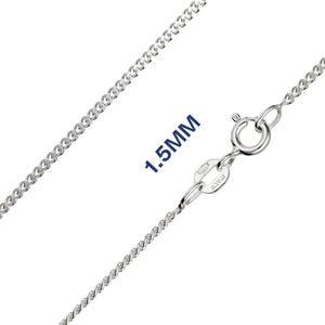 May include: A close-up of a silver curb chain necklace with a spring ring clasp. The chain is 1.5mm thick and has a shiny surface. The clasp is marked "ITALY".