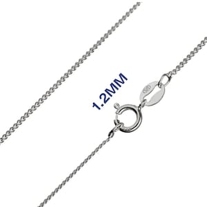 May include: A silver chain necklace, 1.2mm wide, with a curb chain design. It has a spring ring clasp. The image shows the necklace against a white background. The text '1.2MM' is visible.