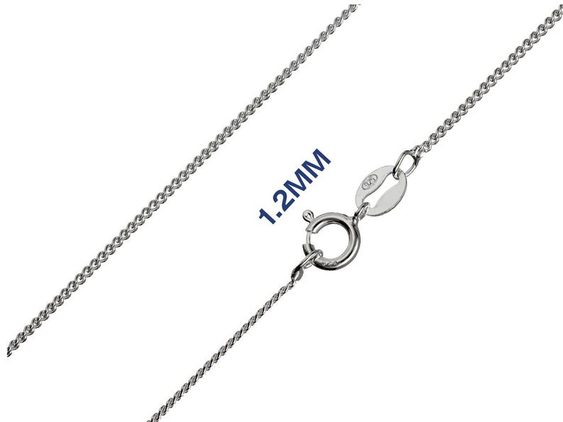 May include: A silver chain necklace, 1.2mm wide, with a curb chain design. It has a spring ring clasp. The image shows the necklace against a white background. The text '1.2MM' is visible.