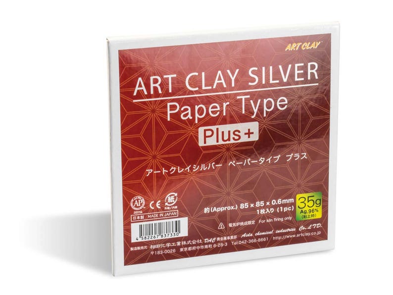 May include: A square package of Art Clay Silver Paper Type Plus, featuring a deep red background with a geometric star pattern. The white text reads Art Clay Silver Paper Type Plus, with a 35g weight label and dimensions of 85 x 85 x 0.6mm.