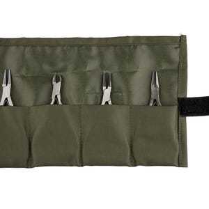 May include: An olive green tool roll containing four pairs of pliers. The pliers are silver with black handles. The tool roll has a black velcro fastening.