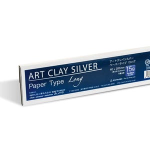 May include: A rectangular white and dark blue box of Art Clay Silver Paper Type Long. The packaging displays the text Art Clay Silver, 15g, 40 x 200mm, and 0.25mm thickness. It includes a barcode, manufacturer details, and certification logos.