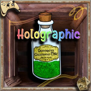 May include: A holographic green glass bottle with a cork stopper and a label that reads "Dehydrated Gelatinous Cube, Just Add Water". The bottle is in a wooden crate with a gold border.
