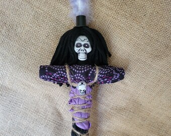 Voodoo Doll Baron Samedi, death LOA of The Cemetary, connects with creation and destruction, he can grant life as well as decide on death.