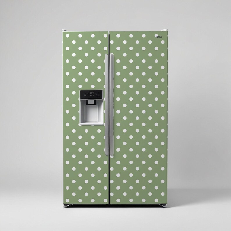 May include: A green refrigerator with white polka dots. The refrigerator has a water dispenser and ice maker.