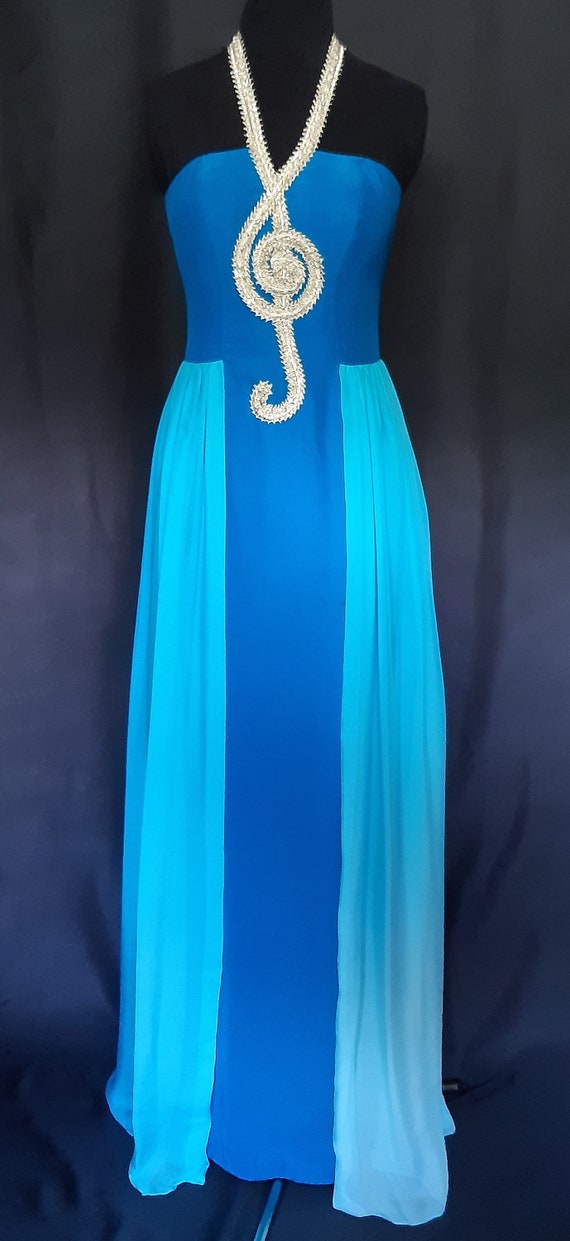 Peacock blue shop evening gowns
