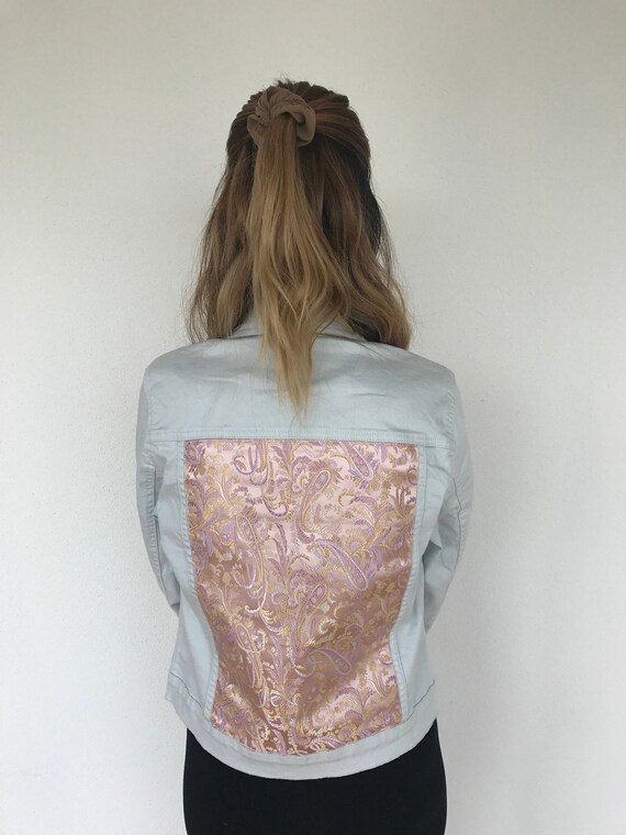 pink and white denim jacket