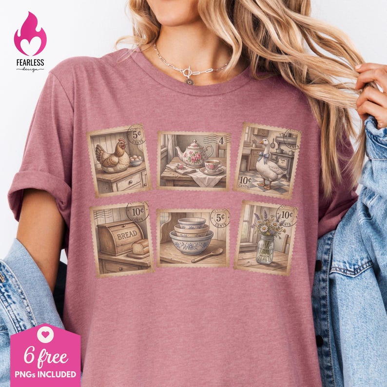 May include: Dusty rose t-shirt featuring six vintage-style postage stamp designs. Each stamp depicts a different kitchen scene, including a hen, teapot, goose, bread, bowls, and flowers. The shirt includes the text "FEARLESS design" and "6 free PNGs included".