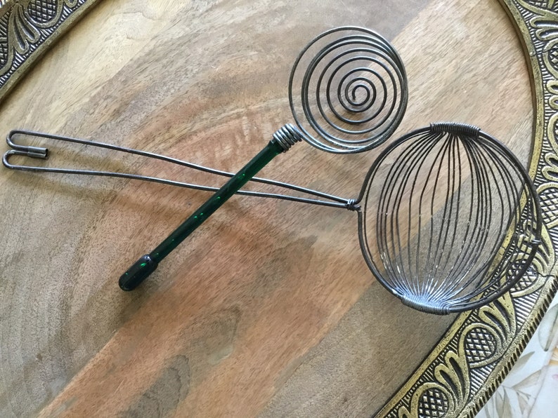 Pair Primitive handled Metal Egg separater strainers