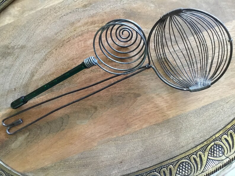Pair Primitive handled Metal Egg separater strainers