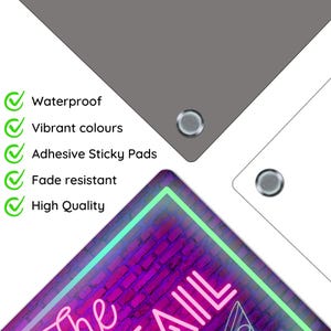 May include: A neon sign featuring the text "The Nail" in pink and green neon lights. The sign is set against a brick wall backdrop. The sign is waterproof, fade resistant, and boasts vibrant colours. It comes with adhesive sticky pads for easy mounting.