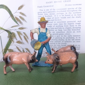 Vintage Crescent Farm-hand Feeding Three Piglets