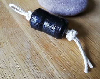 One-of-a-kind keychain made from a cork painted in black