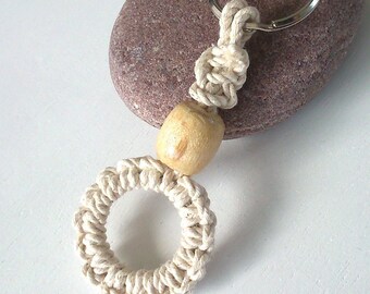 Sailor knot key ring with pearl on ring.