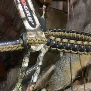 Bow wrist sling with leather yoke