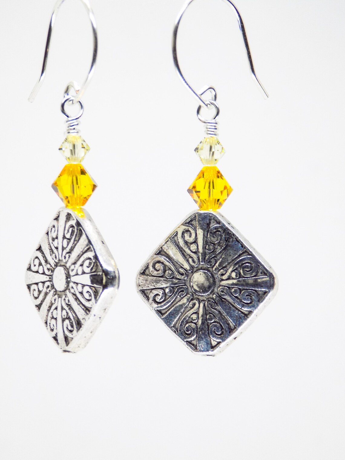 swarovski sun earrings