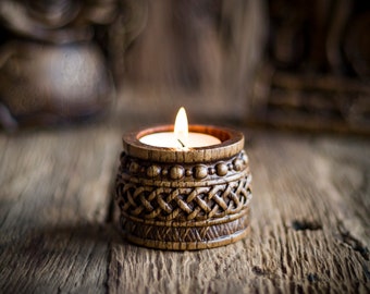 Candle holder with Norse ornaments