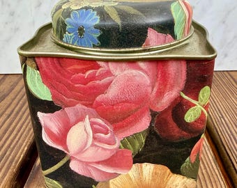 Bote de hojalata vintage con diseño floral, de metal negro, para almacenamiento en la cocina, estilo cottagecore.