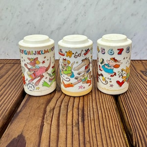 Vintage Johnson & Johnson Rhythm Roller Rattles: 1980s ABC Music Theme Toy Set