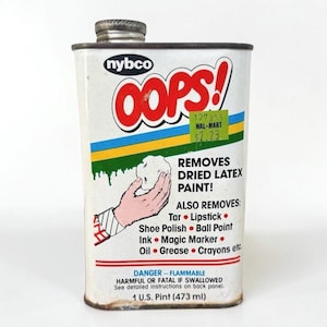 May include: Vintage "Oops!" paint remover can with a metal lid. The can is white with red, blue, and yellow accents. Text on the can includes "Removes Dried Latex Paint!" and a list of other substances it removes. The can is 1 U.S. Pint (473 ml).