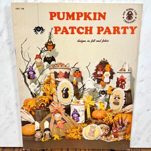 May include: A craft pattern booklet titled Pumpkin Patch Party featuring designs in felt and fabric. The cover displays various autumn-themed decorations including pumpkins, a broom, ghosts, bats, and small figures of animals and people.