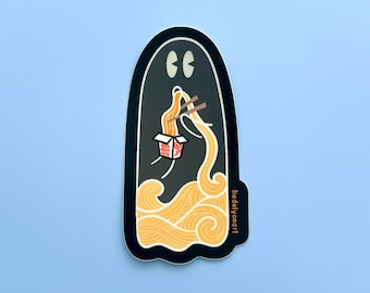 May include: A black ghost-shaped sticker with a cartoon face and a noodle bowl with chopsticks inside. The noodles are yellow and flowing out of the bowl like waves. The text "liaddelyonart" is in the bottom right corner.