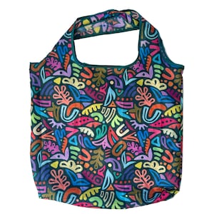 May include: Reusable shopping bag with a colorful abstract pattern. The bag features a dark background with a vibrant design of shapes in shades of red, blue, green, yellow, and purple. The bag has a dark green trim and handles.