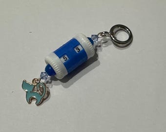 Blue beaded row counter with light blue cat token
