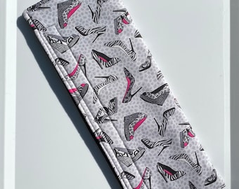 Shoe themed seatbelt covers