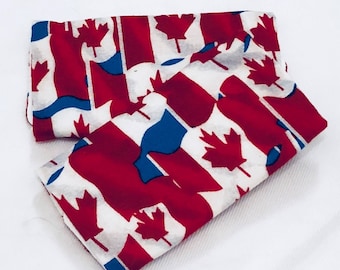 Canadian Flag Luggage Identifiers with Blue Sky