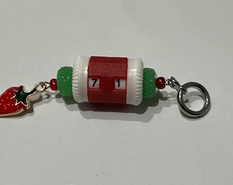 Red beaded row counter with strawberry