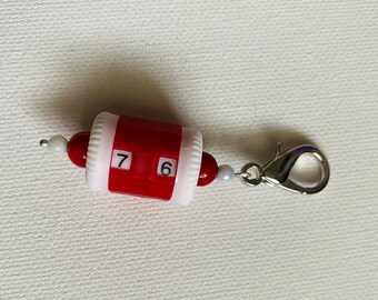 Red beaded row counter with red beads