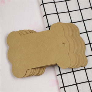 50 Uds. Etiquetas de papel Kraft con forma de hueso de 78x101mm para regalos, etiquetado, etiquetas de ventas, etiquetas de papel Kraft hechas a mano para bodas, Diy PP012