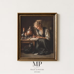Op de afbeelding: Een ingelijste vintage print met een vrouw die aan een tafel schrijft met een zwarte kat. De scène bevat kaarsen, een koperen pot en kleine potjes. De print heeft een donker, humeurig kleurenpalet met de tekst "MP MAGIC & POETRY STUDIO".