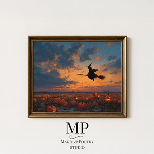 May include: A framed print shows a Halloween scene with a witch on a broomstick over a pumpkin field at sunset. The sky has orange and blue clouds. The print is in a gold-coloured frame. The text "MP MAGIC & POETRY STUDIO" is at the bottom.